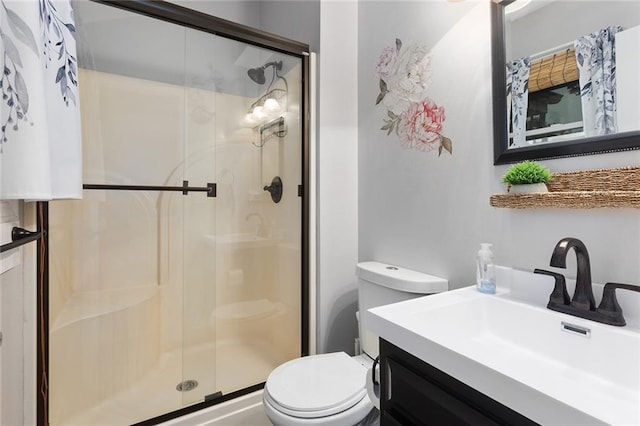 1512 Auburn Dr, Lees Summit, MO 64086 - bathroom featuring toilet, a stall shower, and vanity