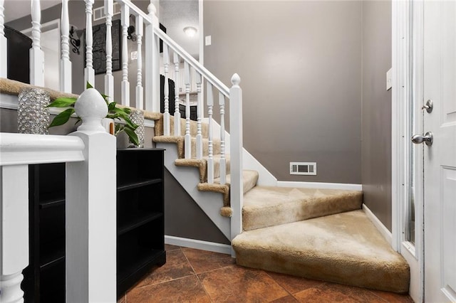 1512 Auburn Dr, Lees Summit, MO 64086 - staircase with baseboards and stone finish flooring