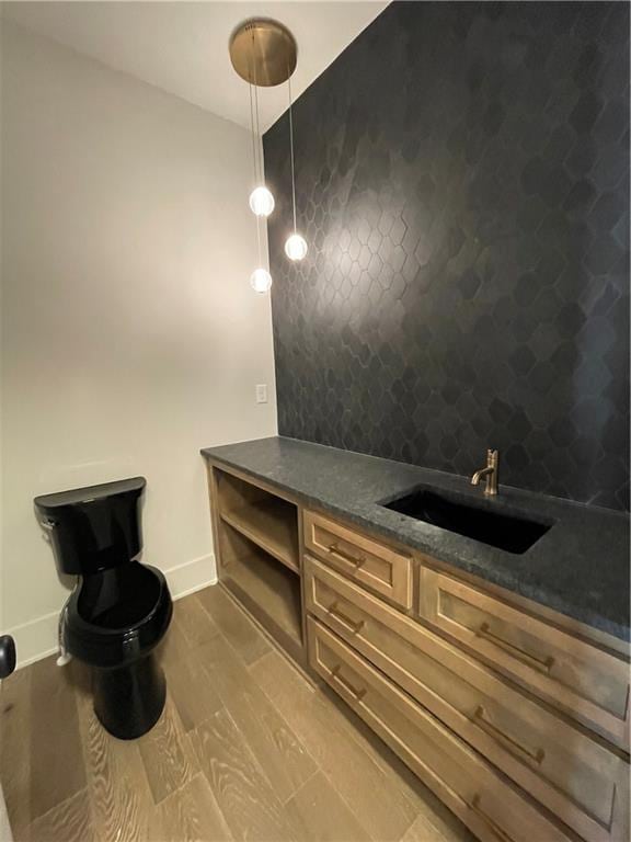 17000 Rosehill St, Overland Park, KS 66221 - bathroom featuring vanity and wood finished floors