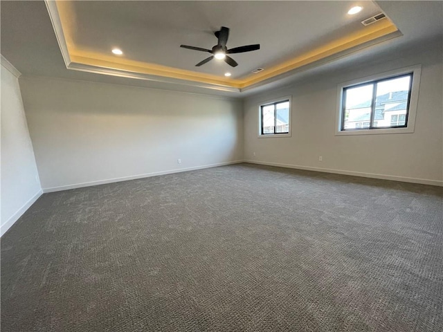 17000 Rosehill St, Overland Park, KS 66221 - unfurnished room featuring a raised ceiling, ceiling fan, recessed lighting, and dark colored carpet