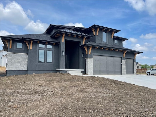 17000 Rosehill St, Overland Park, KS 66221 - prairie-style house with stone siding, driveway, stucco siding, and an attached garage