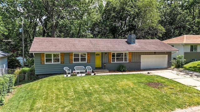 10621 E 32nd St, Independence, MO 64052 - ranch-style home with a chimney, a garage, concrete driveway, and a porch