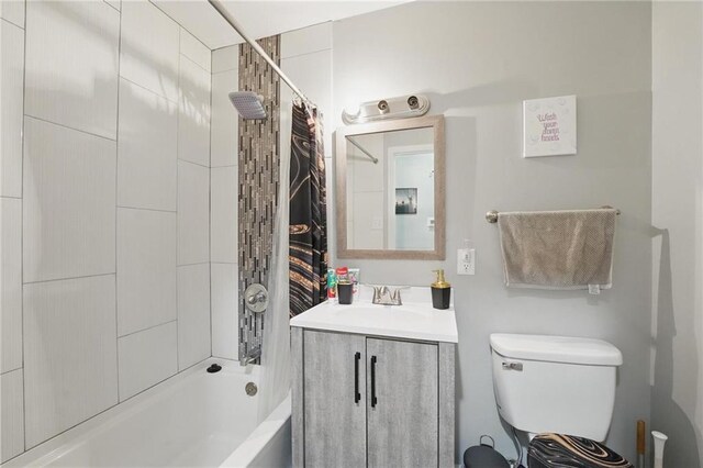 10621 E 32nd St, Independence, MO 64052 - full bathroom with shower / tub combo with curtain, vanity, and toilet