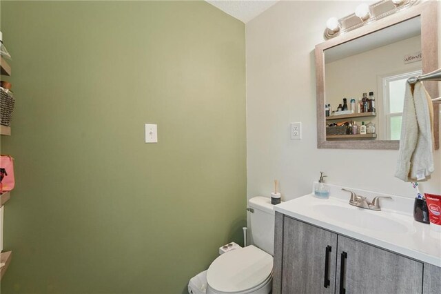 10621 E 32nd St, Independence, MO 64052 - bathroom featuring vanity and toilet