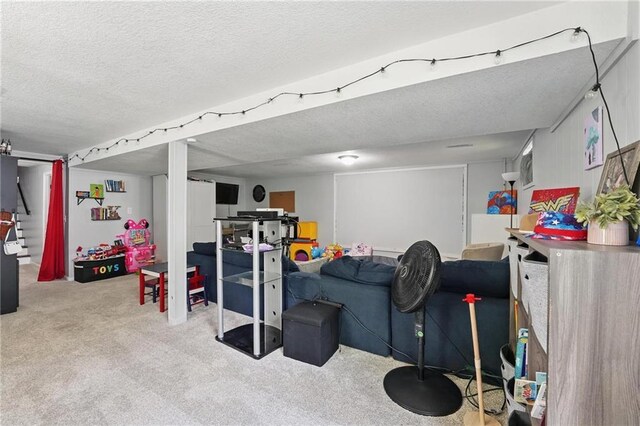10621 E 32nd St, Independence, MO 64052 - carpeted living area with a textured ceiling