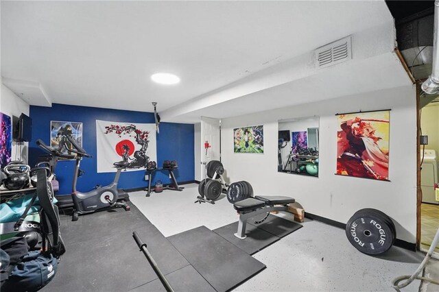10621 E 32nd St, Independence, MO 64052 - workout room with baseboards and washer / dryer