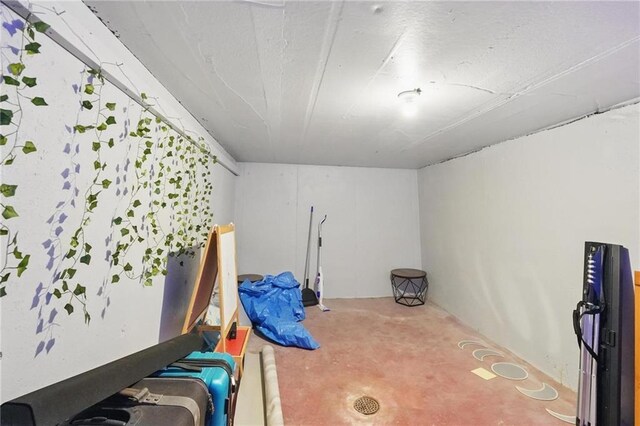 10621 E 32nd St, Independence, MO 64052 - bedroom with concrete flooring