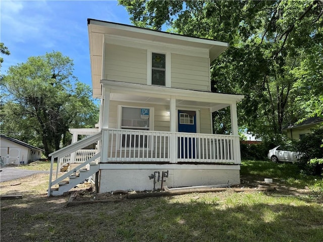116 N Home St, Independence, MO 64053 - view of front of home featuring covered porch