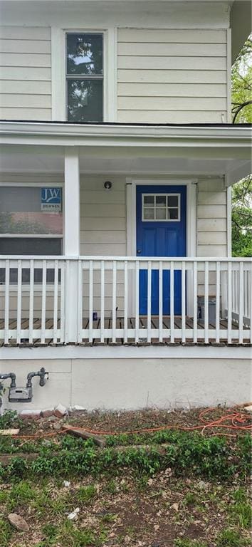116 N Home St, Independence, MO 64053 - doorway to property with covered porch