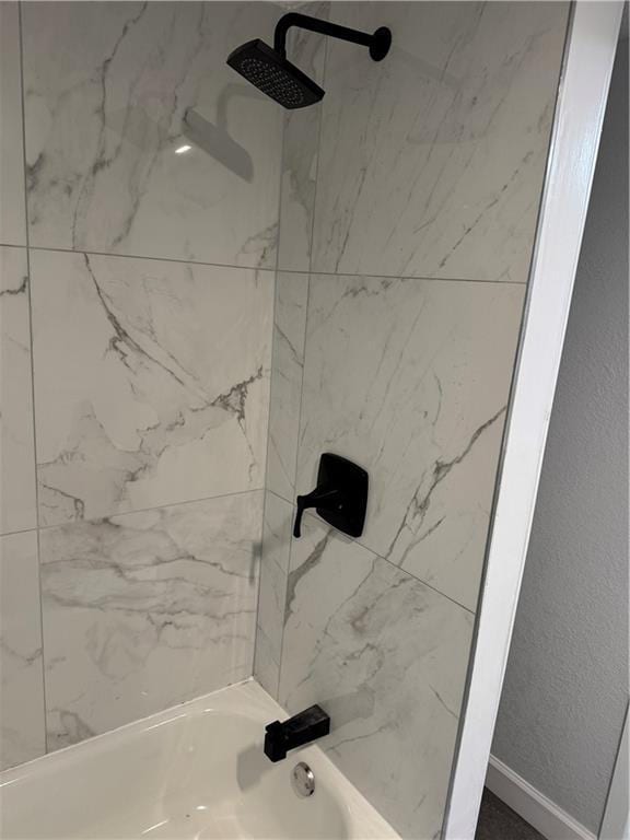 116 N Home St, Independence, MO 64053 - full bath with shower / tub combination and baseboards