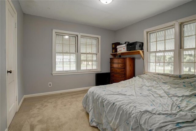2738 S Crysler Ave, Independence, MO 64052 - bedroom with baseboards and light colored carpet