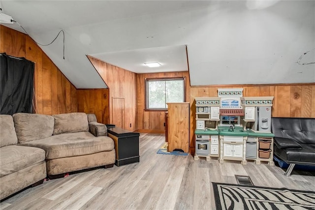 2738 S Crysler Ave, Independence, MO 64052 - home office with wooden walls, light wood-style floors, and vaulted ceiling