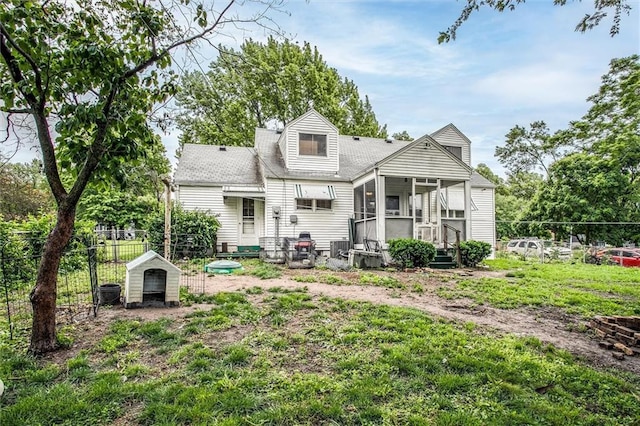 2738 S Crysler Ave, Independence, MO 64052 - rear view of property featuring a sunroom
