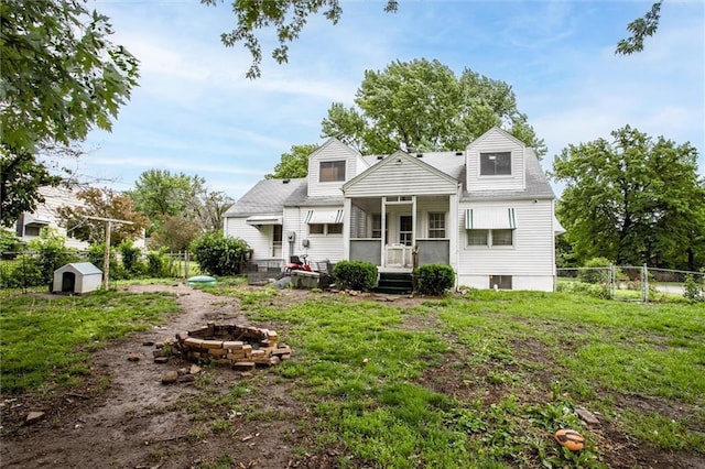 2738 S Crysler Ave, Independence, MO 64052 - back of property with a fire pit