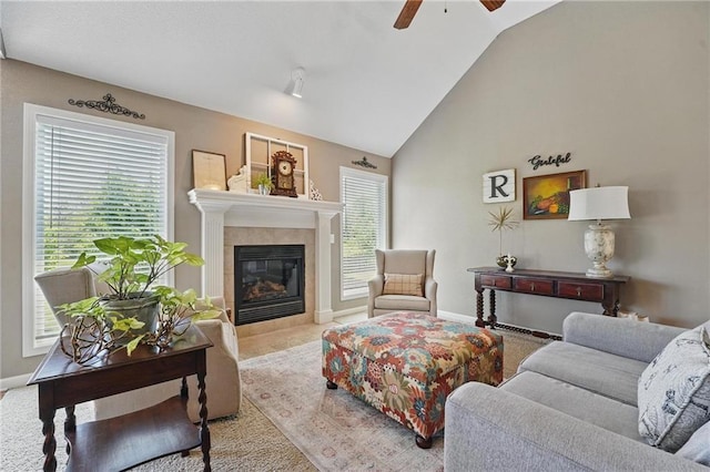 1037 NW 91st Ter, Kansas City, MO 64155 - living area with a ceiling fan, a fireplace, lofted ceiling, baseboards, and carpet flooring