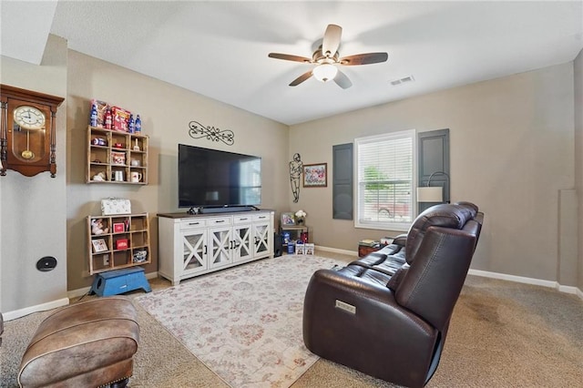 1037 NW 91st Ter, Kansas City, MO 64155 - carpeted living area with a ceiling fan and baseboards