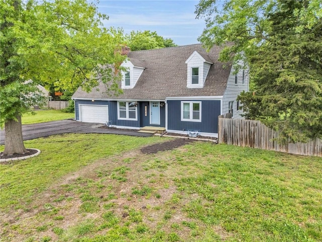 706 W Cedar St, Olathe, KS 66061 - cape cod house with asphalt driveway, an attached garage, and roof with shingles