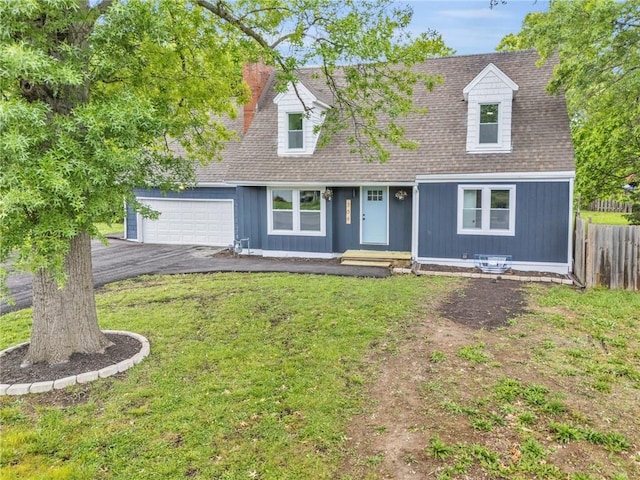 706 W Cedar St, Olathe, KS 66061 - cape cod home featuring driveway, a garage, and a shingled roof
