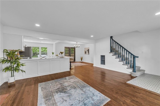 706 W Cedar St, Olathe, KS 66061 - living area with a chandelier, stairway, wood finished floors, and recessed lighting
