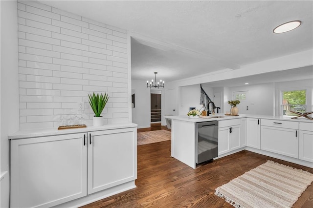 706 W Cedar St, Olathe, KS 66061 - kitchen featuring dishwasher, dark wood-type flooring, white cabinetry, a chandelier, and light countertops