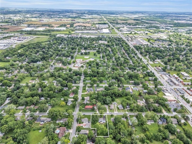 706 W Cedar St, Olathe, KS 66061 - aerial view of property's location featuring a tree filled landscape