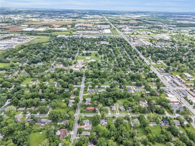 706 W Cedar St, Olathe, KS 66061 - aerial view of property's location with a tree filled landscape