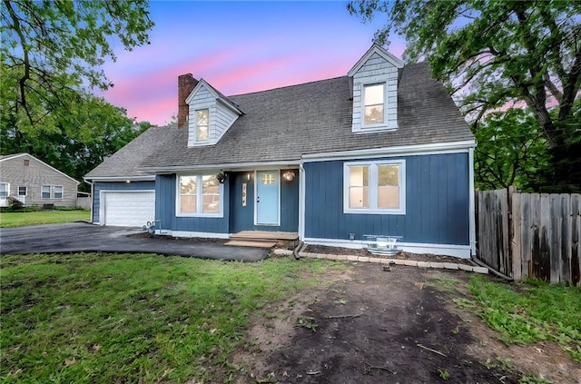 706 W Cedar St, Olathe, KS 66061 - new england style home with a chimney, driveway, and a garage