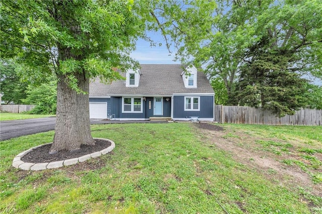706 W Cedar St, Olathe, KS 66061 - cape cod-style house with a garage