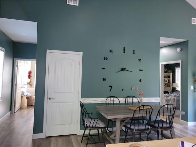 1154 SE 364p Rd, Clinton, MO 64735 - dining space with wood finished floors, healthy amount of natural light, and baseboards