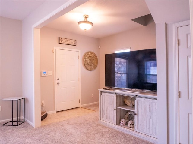 3812 Anderson Ave, Kansas City, MO 64132 - foyer entrance with carpet flooring and baseboards