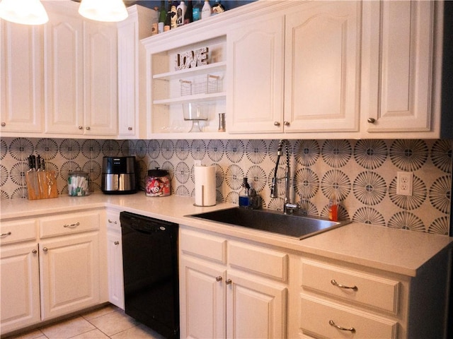 3812 Anderson Ave, Kansas City, MO 64132 - kitchen featuring dishwasher, open shelves, a sink, decorative backsplash, and light countertops
