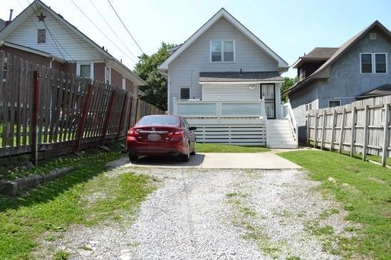 3812 Anderson Ave, Kansas City, MO 64132 - back of property with driveway and stairway