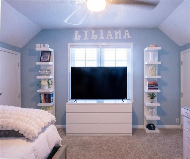 3812 Anderson Ave, Kansas City, MO 64132 - bedroom with vaulted ceiling, carpet, baseboards, and a ceiling fan