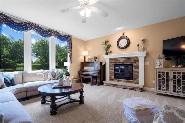 15801 Parkhill St, Overland Park, KS 66221 - living room with carpet floors, ceiling fan, and a fireplace