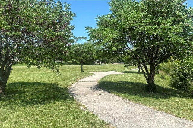 15801 Parkhill St, Overland Park, KS 66221 - view of property's community featuring a yard