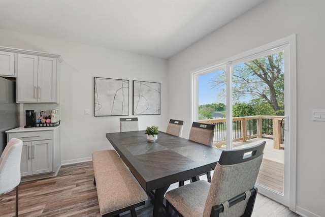 2208 Crestview Pl, Raymore, MO 64083 - dining space featuring light wood-type flooring and baseboards