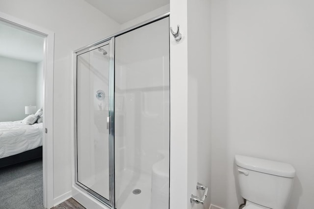 2208 Crestview Pl, Raymore, MO 64083 - ensuite bathroom featuring a shower stall and toilet