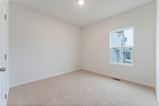 2208 Crestview Pl, Raymore, MO 64083 - unfurnished room with baseboards and light colored carpet
