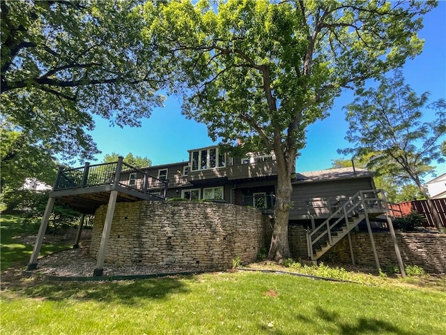 6317 Sherwood Ln, Shawnee, KS 66203 - back of house featuring stairway, a deck, and a yard