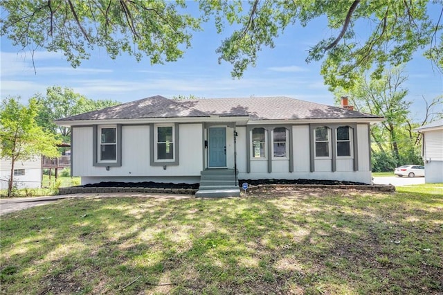 8823 E 111th St, Kansas City, MO 64134 - ranch-style house featuring a front lawn and a chimney