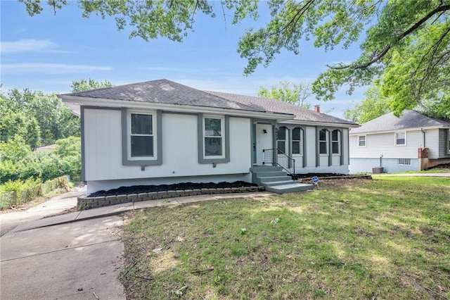 8823 E 111th St, Kansas City, MO 64134 - single story home featuring a front yard and a shingled roof