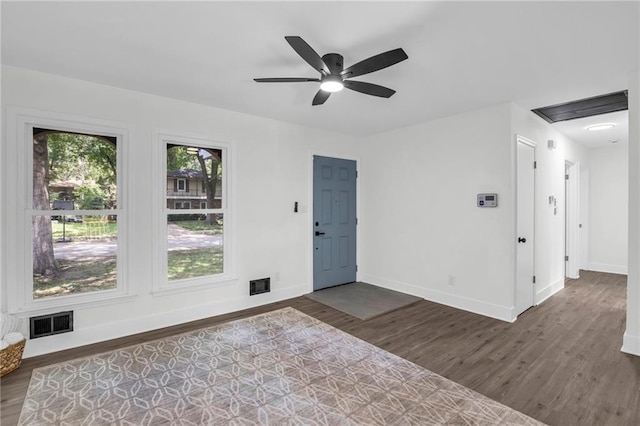 8823 E 111th St, Kansas City, MO 64134 - spare room with wood finished floors, baseboards, and ceiling fan