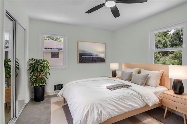 8823 E 111th St, Kansas City, MO 64134 - bedroom featuring carpet, a ceiling fan, and baseboards