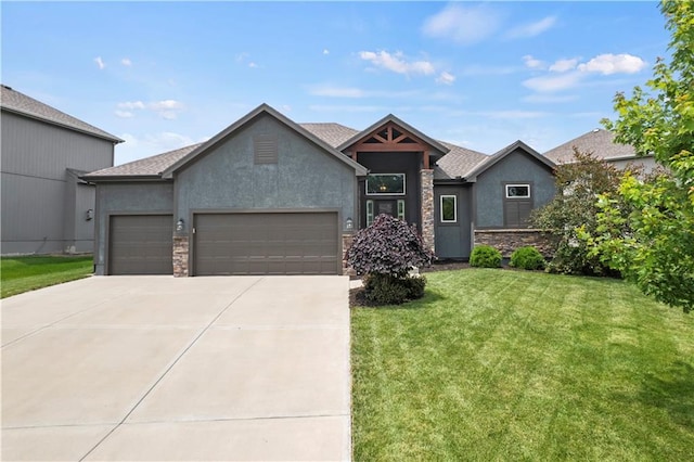 8756 Houston St, Lenexa, KS 66227 - view of front of home with stucco siding, an attached garage, driveway, a front yard, and stone siding