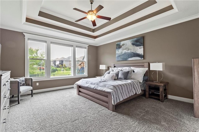 8756 Houston St, Lenexa, KS 66227 - carpeted bedroom with a raised ceiling, crown molding, and ceiling fan