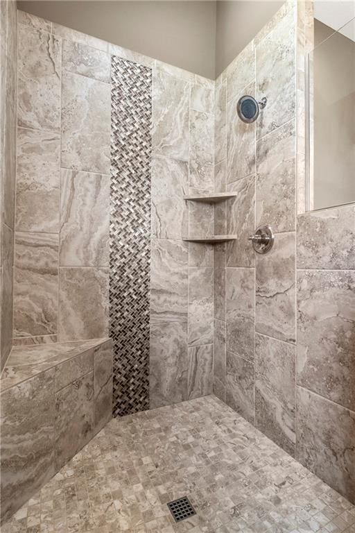 8756 Houston St, Lenexa, KS 66227 - bathroom featuring a tile shower