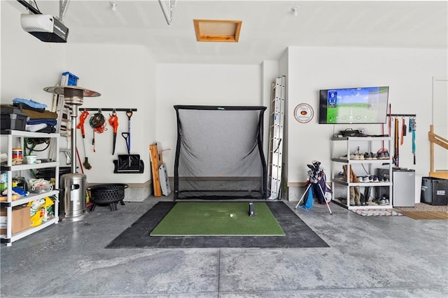 8756 Houston St, Lenexa, KS 66227 - garage featuring a garage door opener