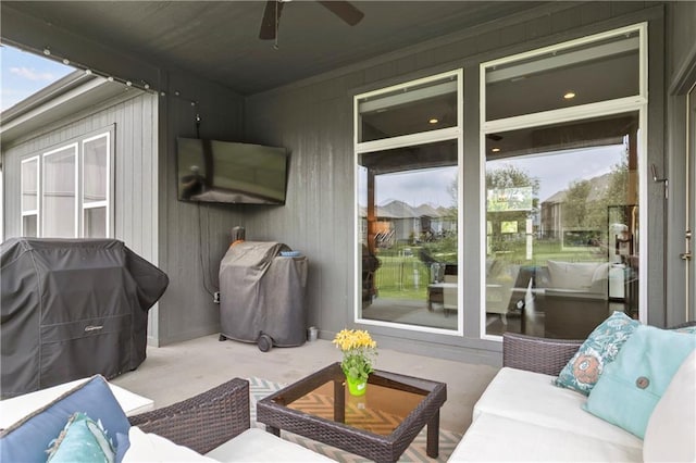8756 Houston St, Lenexa, KS 66227 - view of patio / terrace with an outdoor living space, a ceiling fan, and area for grilling