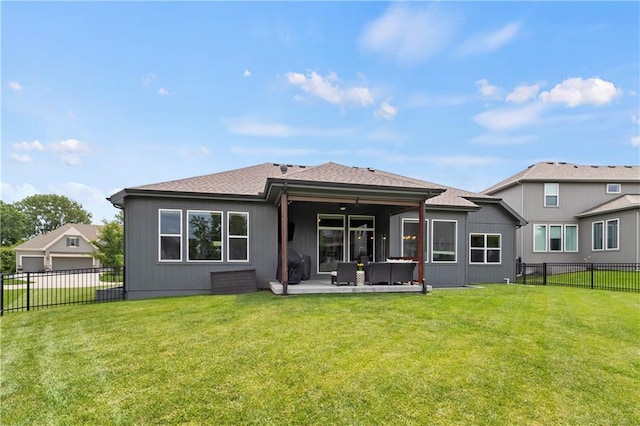 8756 Houston St, Lenexa, KS 66227 - back of property featuring a fenced backyard, a patio area, outdoor lounge area, and roof with shingles