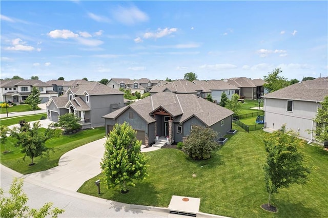 8756 Houston St, Lenexa, KS 66227 - view of front of property featuring a residential view, concrete driveway, and a front yard
